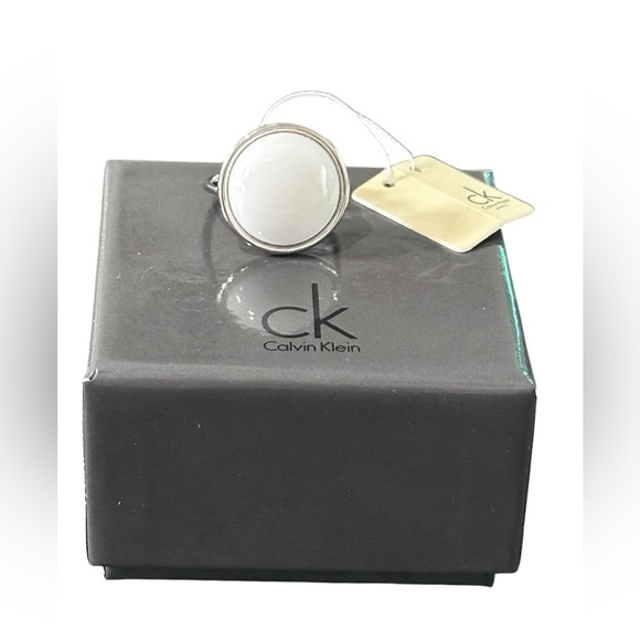 Calvin Klein NWT Loop Two Tone Ring with a Round White Coral Stone Size 9 - Picture 7 of 8